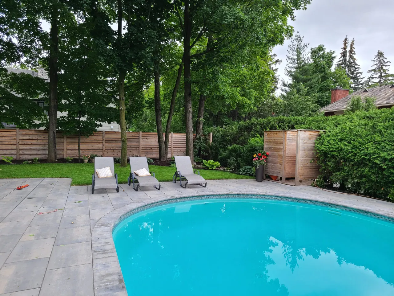 Backyard pool deck hardscape in Stittsville by ALM Construction